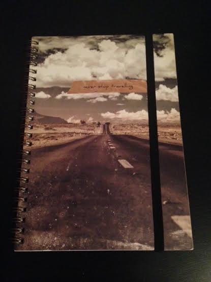 Never stop travelling notebook from typo